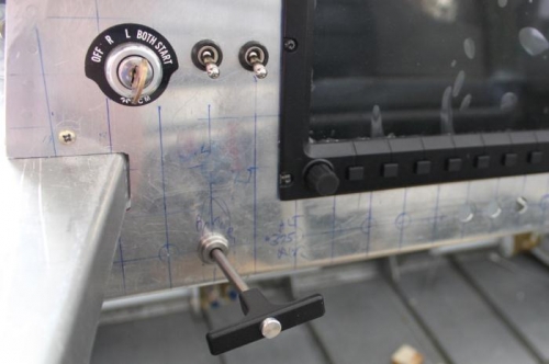 You push brakes then pull this handle to the stop to set parking brake.