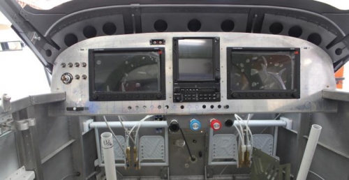 Starting to look like an airplane panel should. Couple more holes and it will get painted.