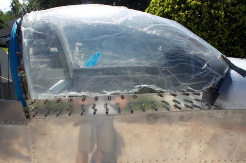 With canopy held tight with #30 clecoes, heat makes the forward corners lift slightly. Scary.