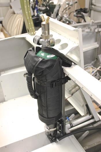 Tank is final mounted in position and secured.