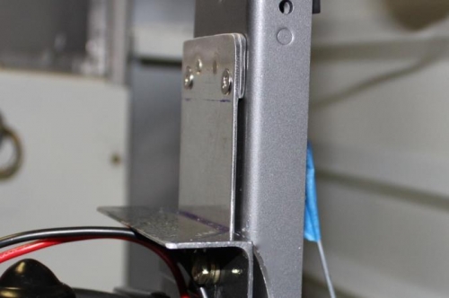 Webbing belt loop installed on upright flap housing support. Flush screws aren't tight in this picture