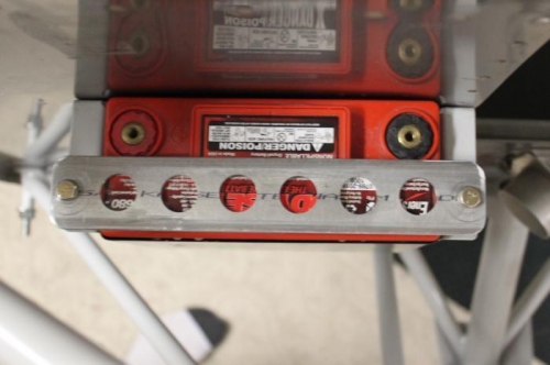 3/4 lightening holes in tie down bar plus spacers underneath.