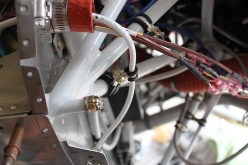 VPX bus feed secured just prior to passing through firewall.