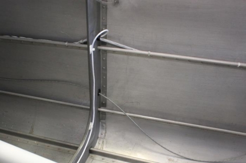 Elevator trim wiring heads down to fuselage conduit. OAT keeps going forward.