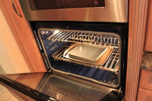 Yep. Cookie sheet on oven rack. 180F 15 mins.