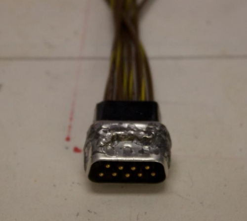 Male DB9 is trimmed, soldered and has some test pins in it for fitting.