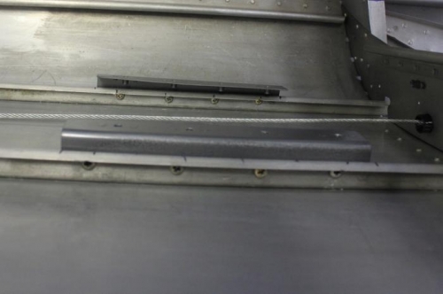 4 holes in each J stringer for the brackets.