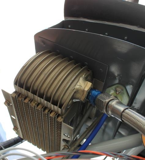 Rear inboard baffle flange cutout to clear engine mount.