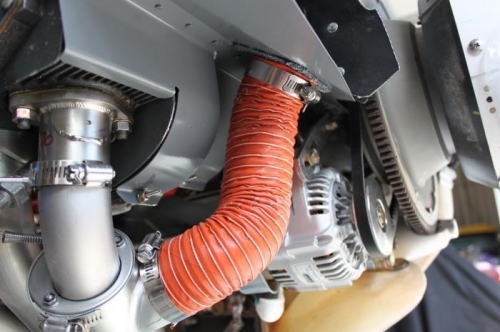 Cabin heat scat tube connected to exhaust pipe and inlet ramp.