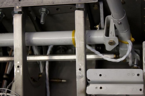 Key to little left/right movement is to secure wire as high on stick as you can before curving aft.