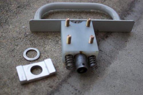 1/4 alum bar filed down in middle to retain washer, which spreads the pulldown load onto the bar.