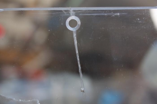 Cracked hole fixed, drillled and countersunk.