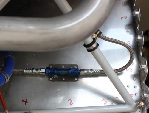 Routed the lines to adel clamps on each engine mount tube for stability.