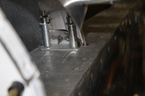 Pilot side. Same on the other side. Secures panel to deck.