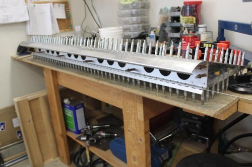 Finished drilling all holes including mounting the hinge.