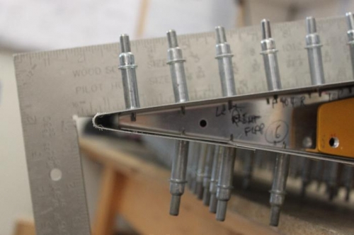 Straight edge shows perfect radius on rear of flap and flat top surface too.