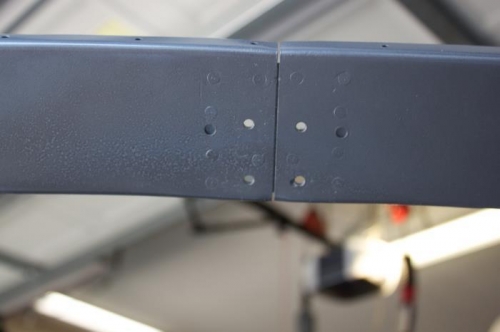 Halves riveted together and match drilled to UHMW. I'll fill tooling holes and center line.