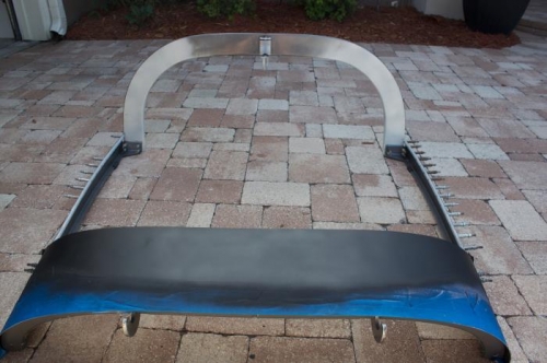 4 coats black.  Probably because primer was white....