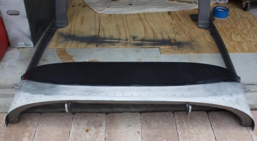 2 to 21/2 inch band de-primed and sanded for future fiberglass work.