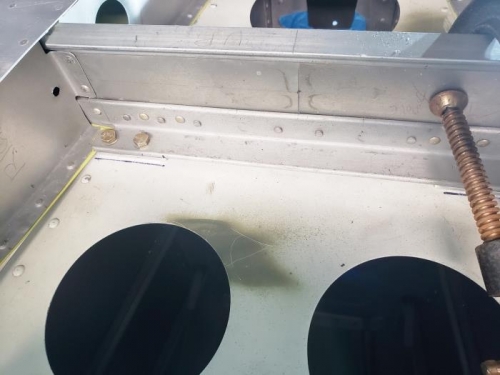 Horizontal bolted in place with 1/8 spacers.