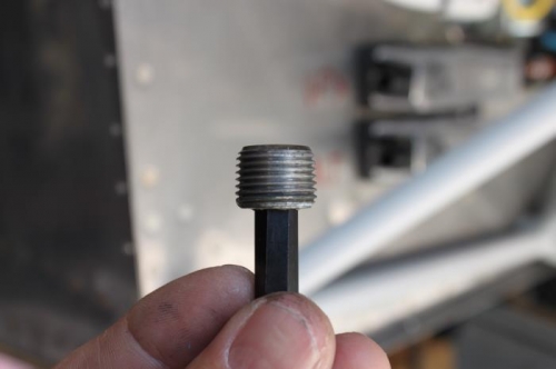 Twisted the heck out of the hand made hex extension inside a strong 5/16 3/8 drive socket.