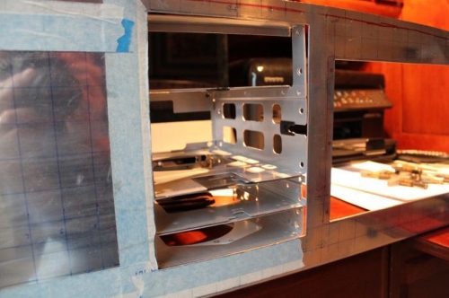 The PM5000 tray sits in the opening exactly. No extra space.