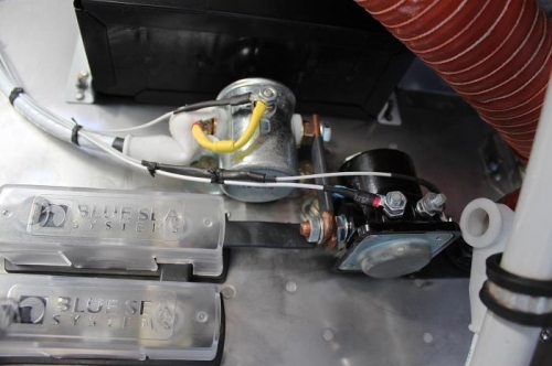 Starter annunciator wire from starter contact including 1200 ohm resistor inside the shrinkwrap there.