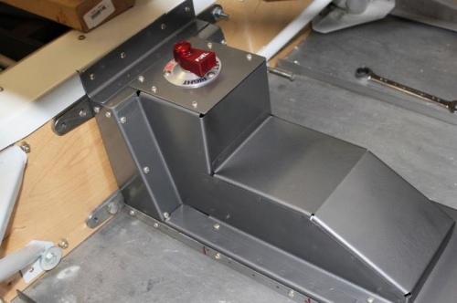 The side and top supports are removable to wrench on the spar bolts...