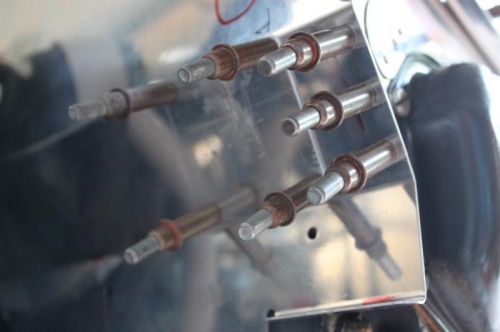 Scat tube opening plugged with fabbed cover.