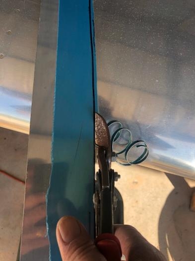 Snipping the parallel fuselage line onto the fairing. Edge finished and kept going.