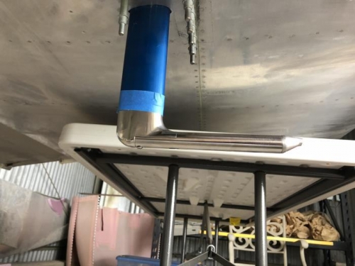 Taped in place prior to drilling for attach screws.