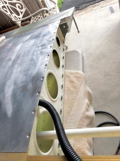 Bottom skin aft of spar.