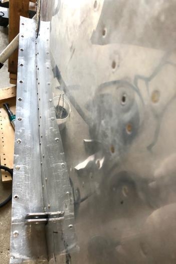 Fuselage overhang dimpled.