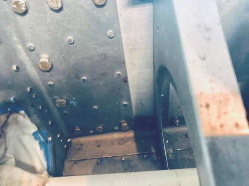 Left aft side of F604 with spar bolts inserted.