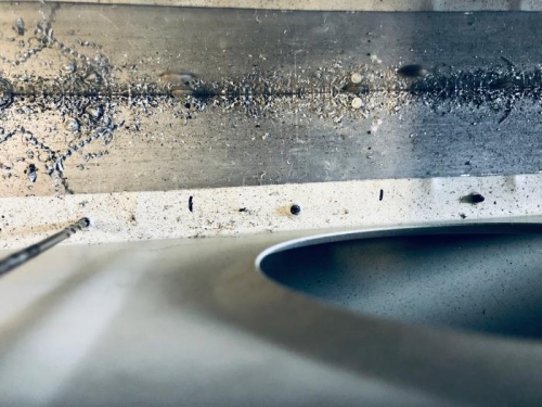 IPhone picture trying to position and match drill through the fuselage skin overhang.