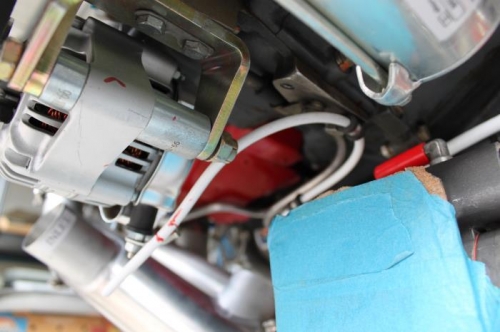 Clamped on block and curved to final connection plus clocking marks.