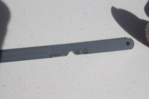 This is the deburring tool I made from a hack saw blade.  Works really well.