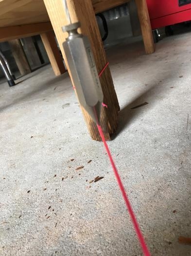 Outer plumb bob on right wing is exactly lined up now.