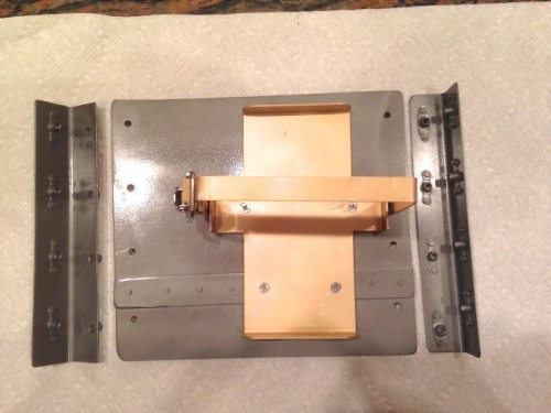 The mounting angles were cut from surplus panel part.  1 inch each side.