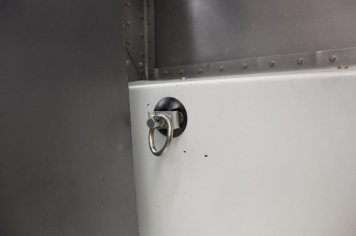 Smoke tank required shifting this tie down rearward to clear.