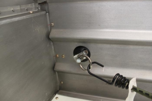 Copilot side baggage wall mount.