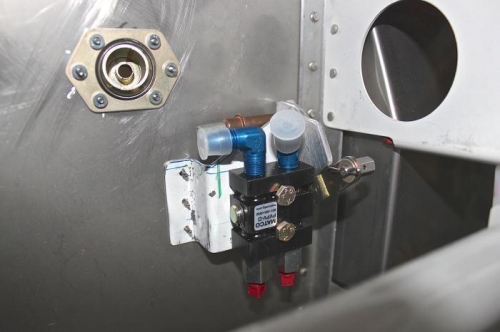 Parking valve mounted on unused sub panel canopy release mounting.