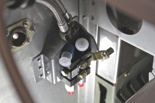 Tape on back of 3/8 closed end wrench starts locknut in tight places.