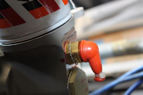 Drilled oil temp probe nut for safety wire and secured.