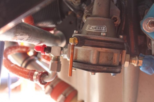 Engine is on an engine stand with threaded rod and galv pipe at dynafocal angles.