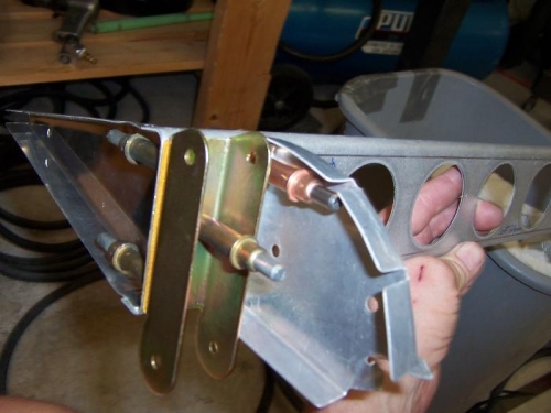 2 flush 3/32 rivets hold the rear end rib to the spar whch is then covered by this hardware