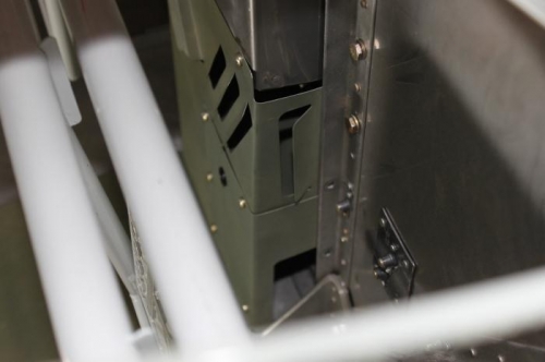 There is a gap in the heater box side so it will be another outlet.