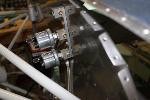 Oil on top. Fuel pressure below.