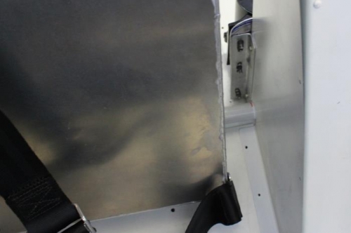 Nut plates for tight working area on this side. Bottom one is for motor grounding.