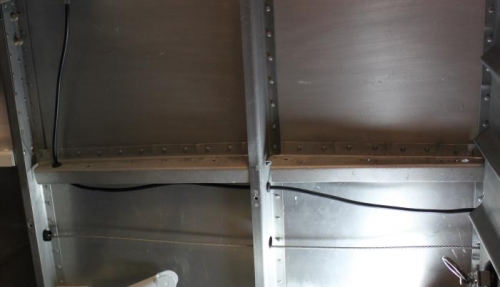 Rubber grommets hold the coax snugly.